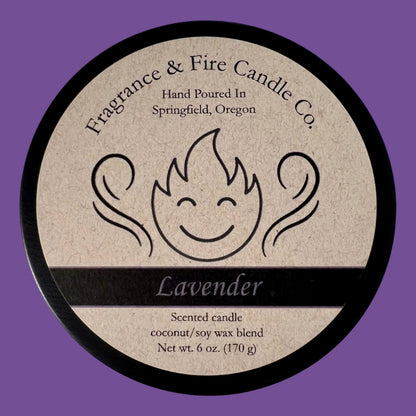 Vibrant purple colored background with round candle top and brown label. Name of the candle on the label is Lavender.